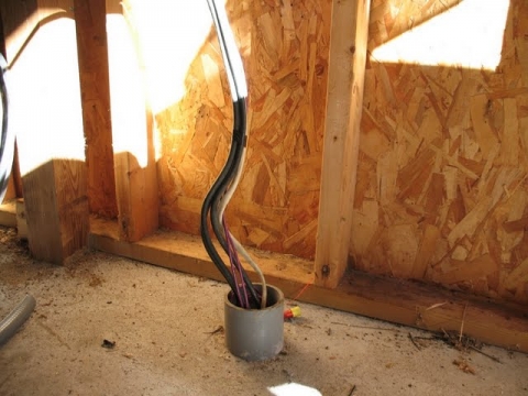 The starting point: all wires come up through an unfinished conduit that heads into the basement of the house where the house inverter and power system resides.