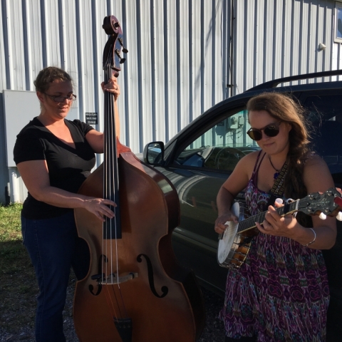September 28. Joanna and Kelsey practicing outside Produce on the Move!