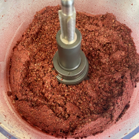 Grinding Staghorn Sumac berries.