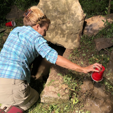 July 8. Mucking out the spring box with a Solo Cup!