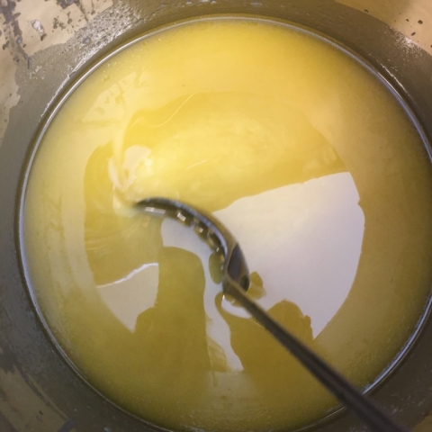 Oils added to milk mixture.