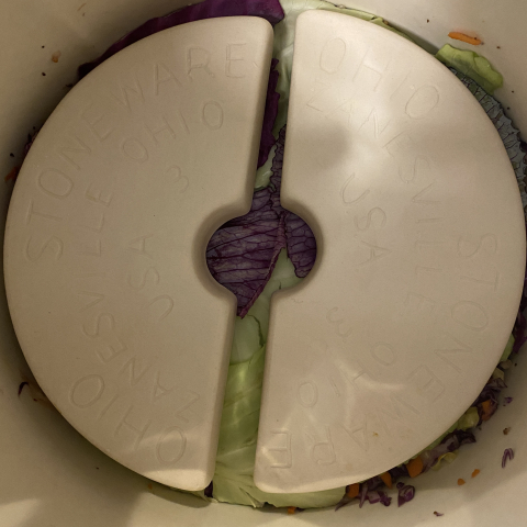 Weights to hold the veggies down in the brine.